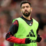 برونو فيرنانديز قائد مانشستر يونايتد مع المدرب مايكل كاريك